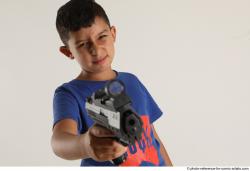 TIMBO STANDING POSE WITH GUN